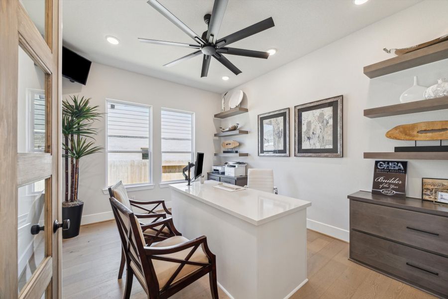 Furnished interior in a model home at The Woodlands Hills – 65' in Willis (Image 5).