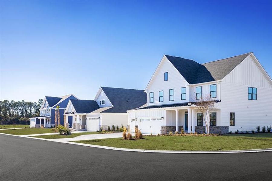 Front exterior of a home in the Grande Dunes North Village Estates community, located in Myrtle Beach, SC (Image 4).
