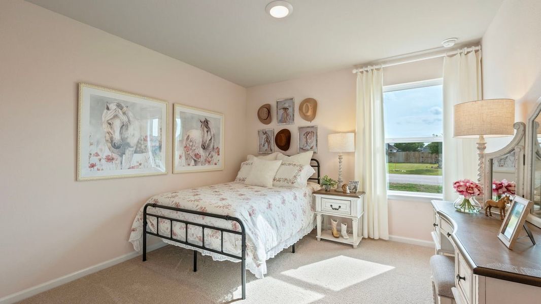 Furnished interior in a model home at Grand Lake in Snook (Image 3).