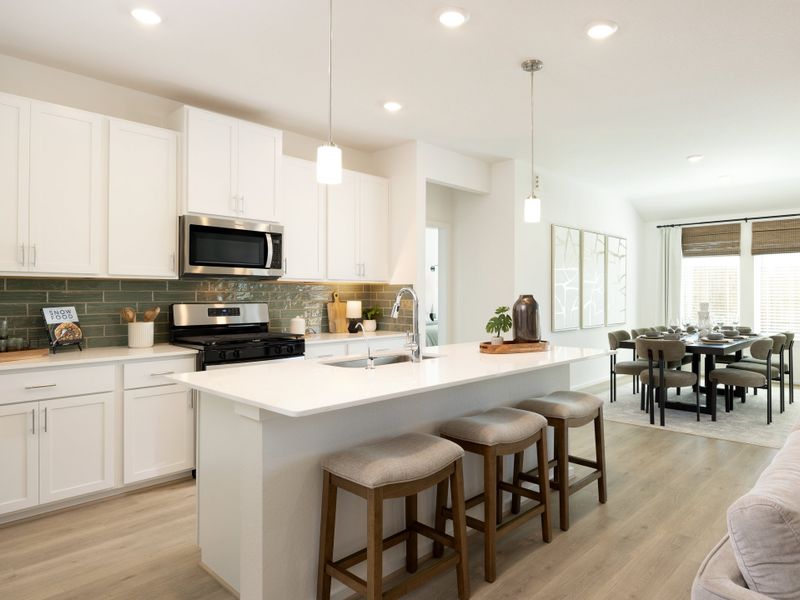 Furnished interior in a model home at Granger Pointe - Premier Series in Conroe (Image 5).