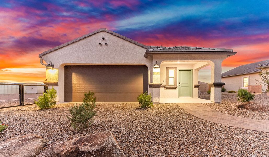 Front exterior of a home in the Saguaro Bloom community, located in Marana, AZ (Image 3). Front exterior of a home in the Saguaro Bloom community, located in Marana, AZ (Image 3).