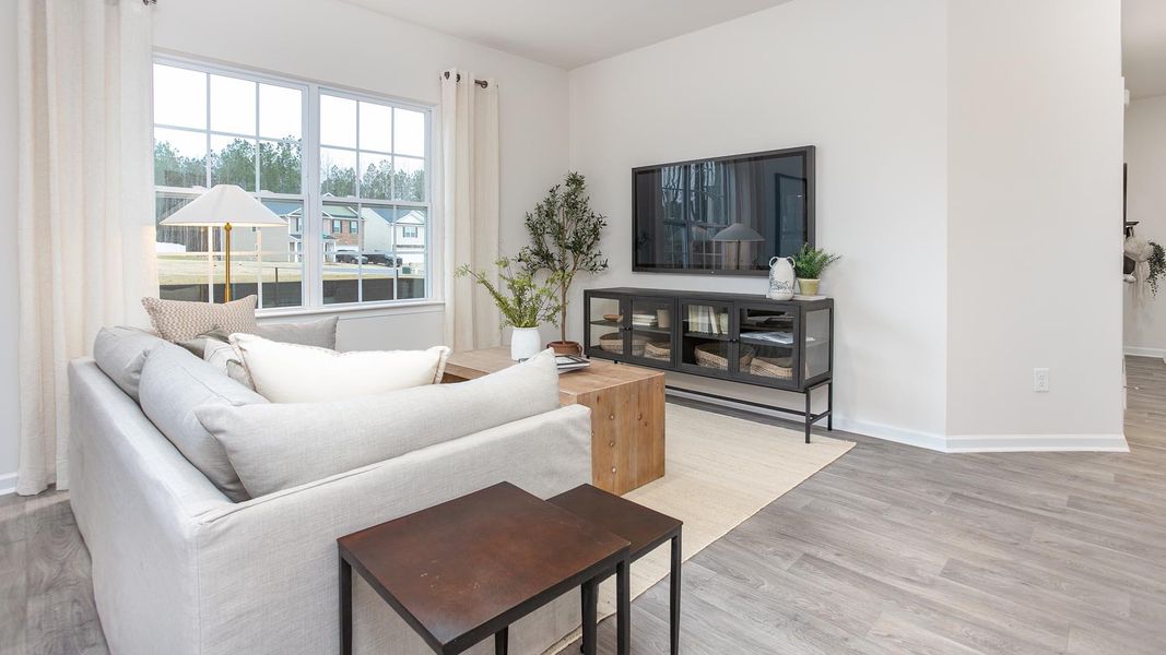 Furnished interior in a model home at The Townes at Riley's Meadow in Haw River (Image 4).