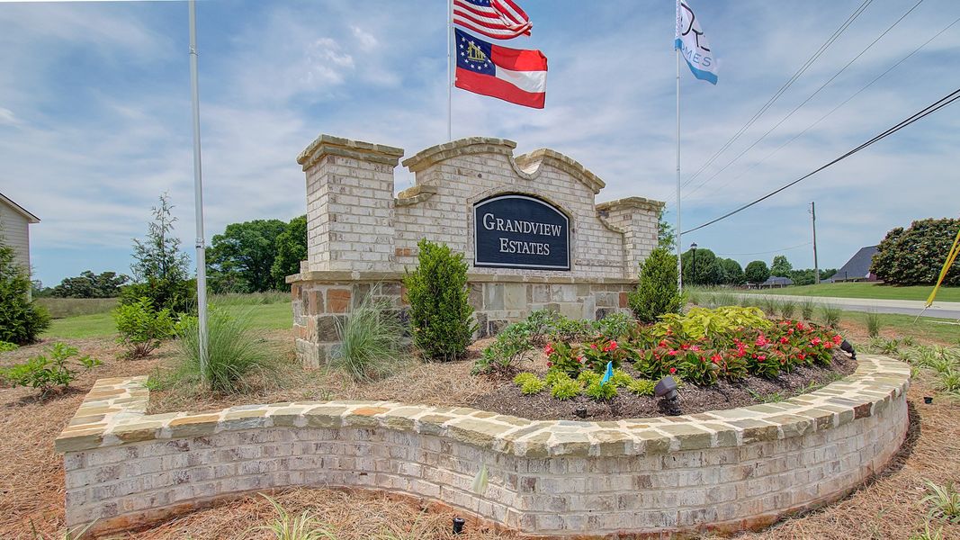 Entrance to the Grandview at Millers Mill community in Stockbridge, GA, featuring signage and landscaping (Image 1). Entrance to the Grandview at Millers Mill community in Stockbridge, GA, featuring signage and landscaping (Image 1).