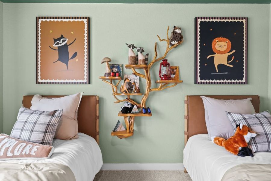 A bedroom with a bed and a shelf with art on it. A bedroom with a bed and a shelf with art on it.