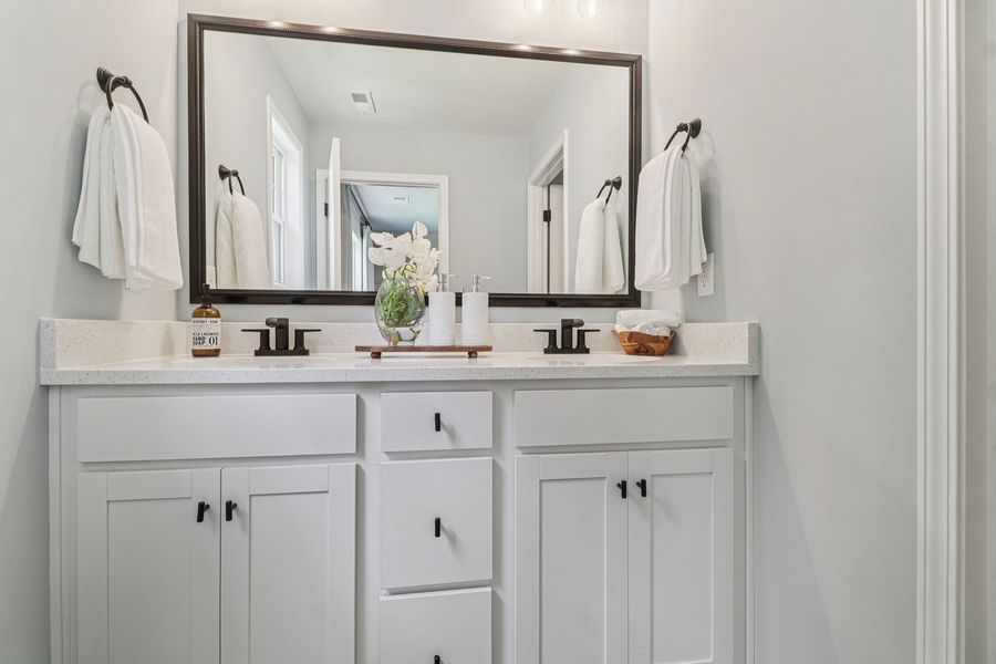 Dual vanities provide added space for busy mornings