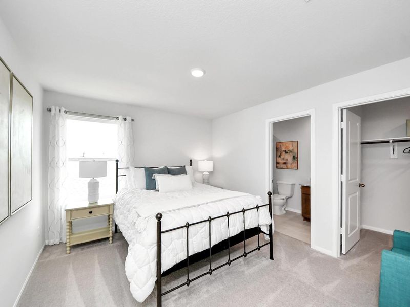 Furnished interior in a model home at Sunterra in Katy (Image 31).