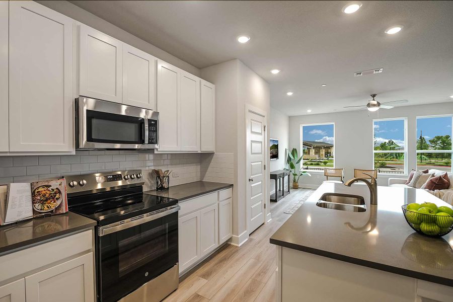 Furnished interior in a model home at Double Creek Crossing Townhomes in Round Rock (Image 5).
