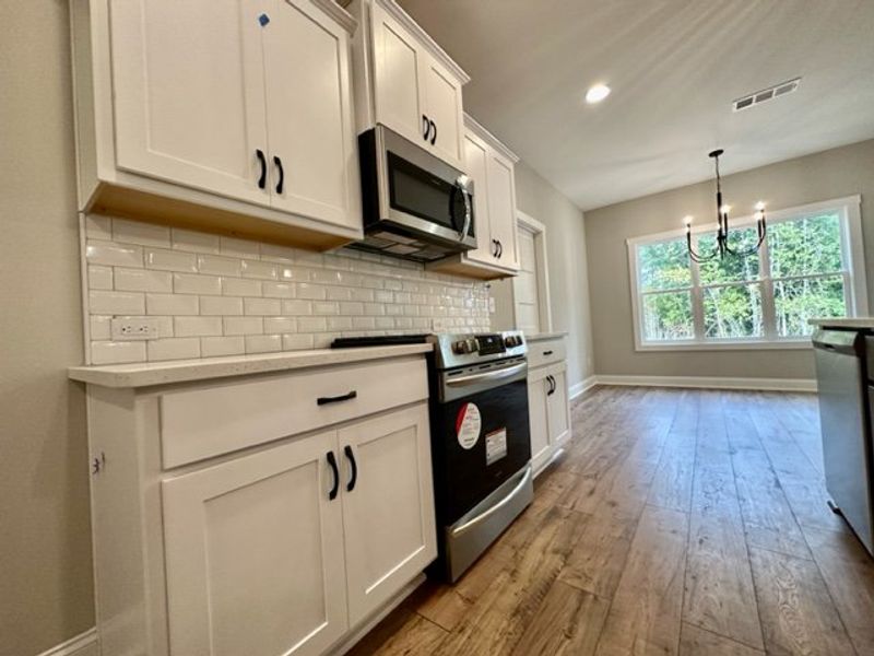 Furnished interior in a model home at Polk Place in Moreland (Image 12).