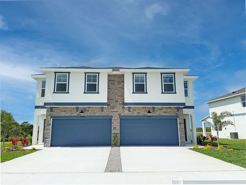 Front exterior of a home in the Emerald Fields community, located in Hudson, FL (Image 2). Front exterior of a home in the Emerald Fields community, located in Hudson, FL (Image 2).