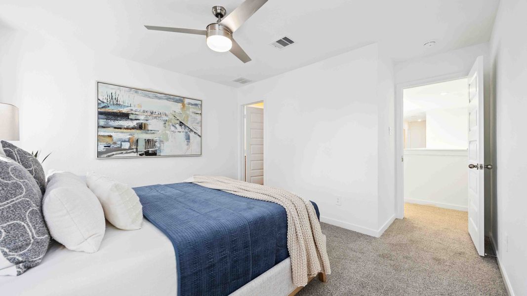 Furnished interior in a model home at Wheatley Oaks in Houston (Image 19).