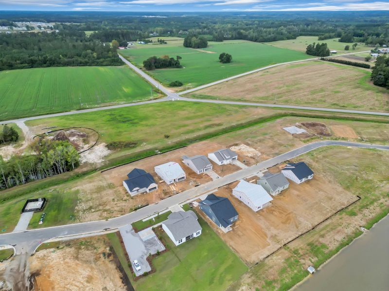 Aerial view of the Edgefield community in Loris, SC, showing layout and nearby surroundings (Image 13). Aerial view of the Edgefield community in Loris, SC, showing layout and nearby surroundings (Image 13).