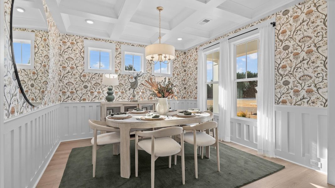 Desirable dining room with coffered ceiling and modern elegance in an established community called Hinson Farm Desirable dining room with coffered ceiling and modern elegance in an established community called Hinson Farm