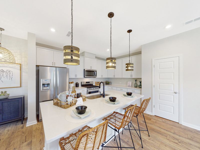 Furnished interior in a model home at Friendship Village Townes in Apex (Image 4).