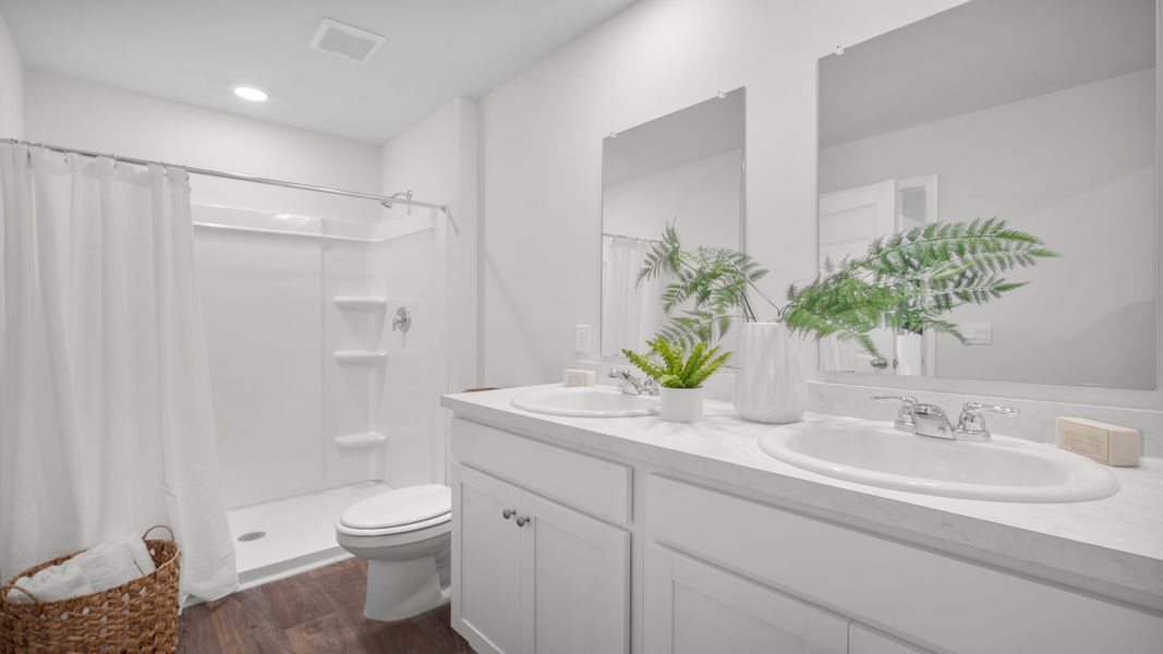 Furnished interior in a model home at Cobblestone Village in Savannah (Image 32).