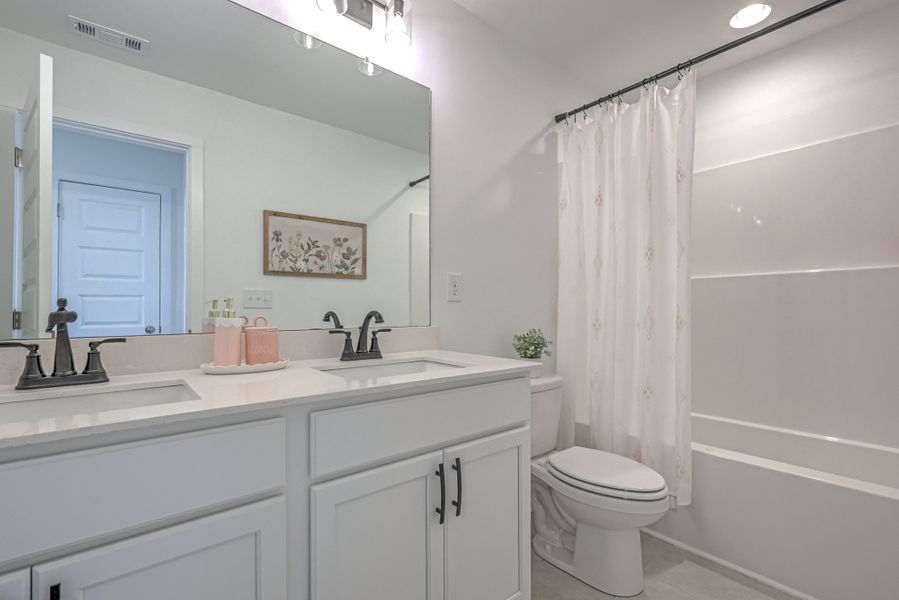 The Winston *Furnished Model Home - Selections and finished may vary.