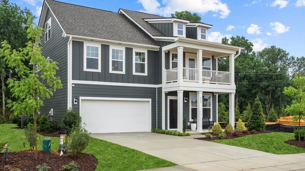 Front exterior of a home in the Station Pointe Phase 2 community, located in Angier, NC (Image 12).