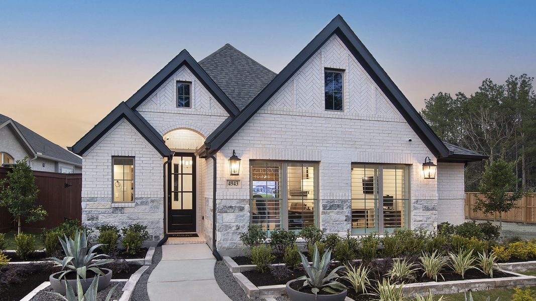 Front exterior of a home in the Wildtree 40' community, located in Magnolia, TX (Image 1). Front exterior of a home in the Wildtree 40' community, located in Magnolia, TX (Image 1).