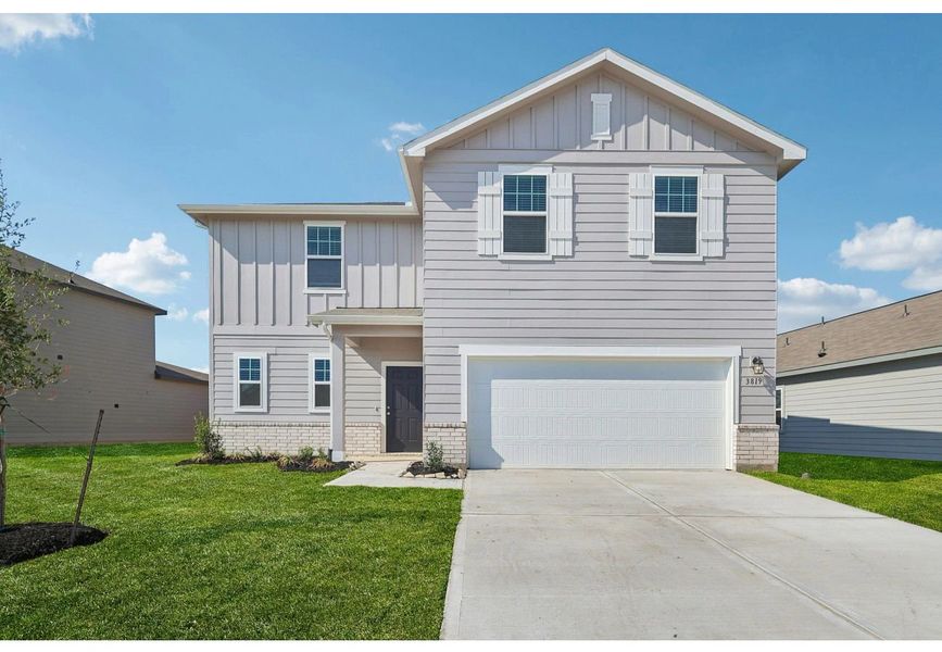 Front exterior of a home in the Royal Pines community, located in Porter, TX (Image 3).