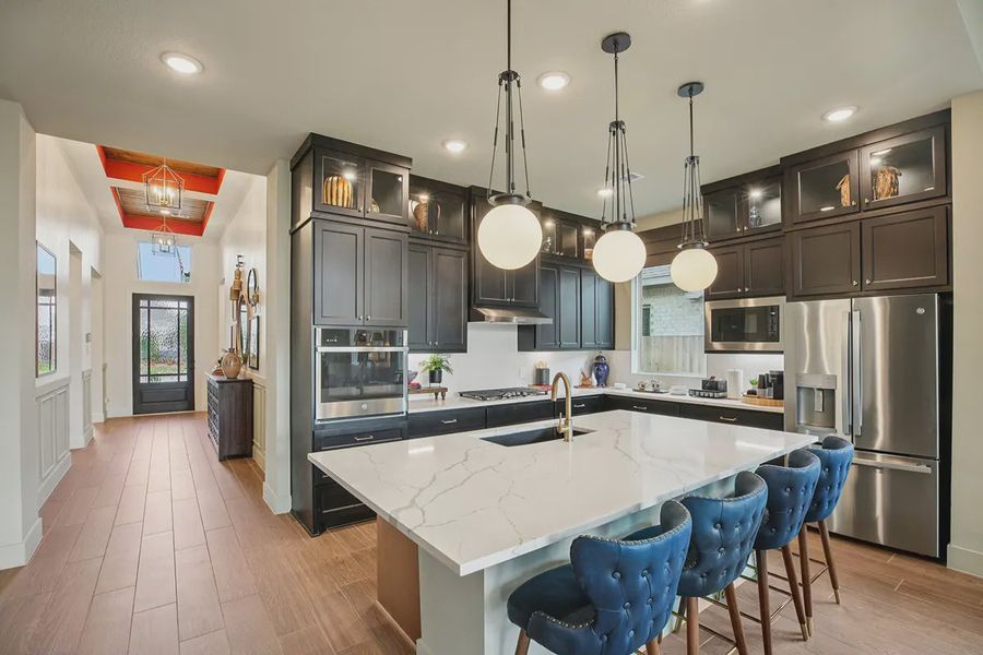 Furnished interior in a model home at Meridiana 50's in Manvel (Image 27).