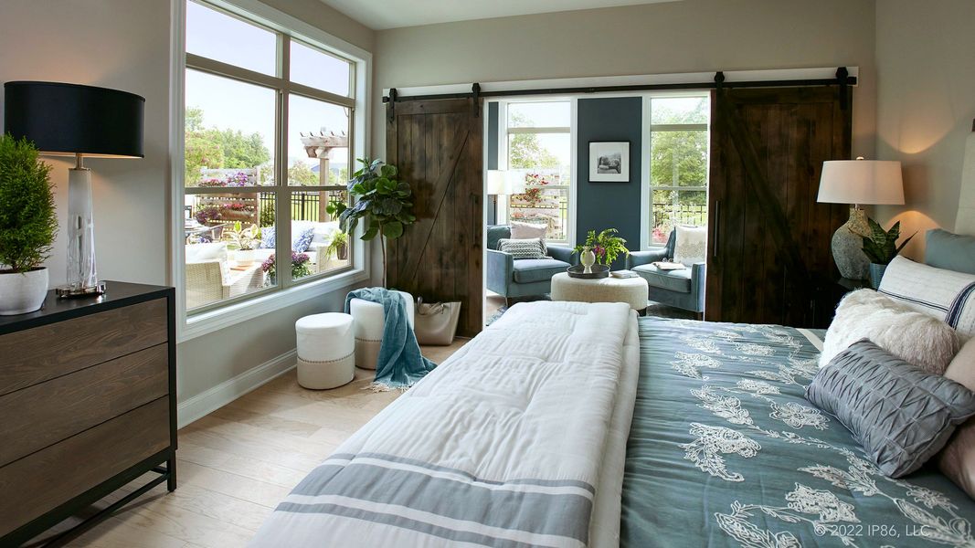 Furnished interior in a model home at The Courtyards at Wimberly in Apex (Image 6).