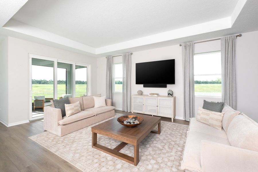 Furnished interior in a model home at Oakfield Trails Traditional in Parrish (Image 4).