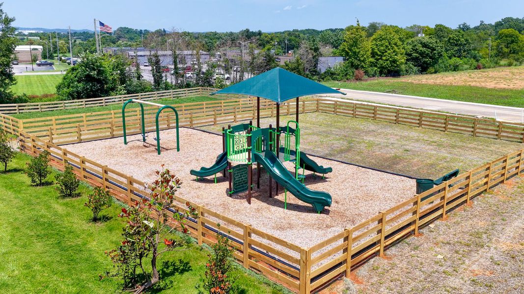 On-site Community Playground and Swing Set with grass area On-site Community Playground and Swing Set with grass area
