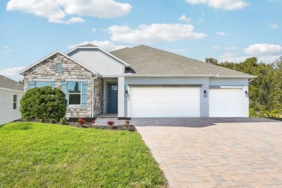 Front exterior of a home in the The Reserve At Hammock Oaks community, located in Lady Lake, FL (Image 3).