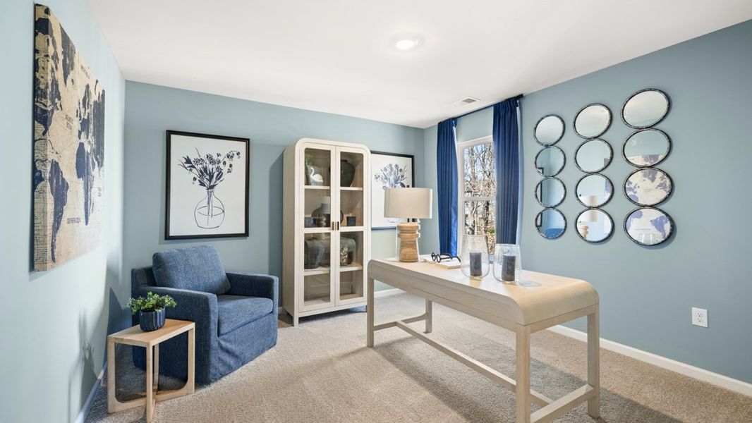 Furnished interior in a model home at Liberty Crossing in Braselton (Image 19).