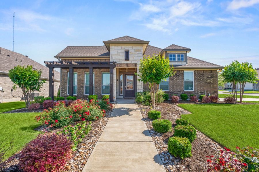 Front exterior of a home in the The Ridge at Belle Meadows community, located in Belton, TX (Image 2). Front exterior of a home in the The Ridge at Belle Meadows community, located in Belton, TX (Image 2).