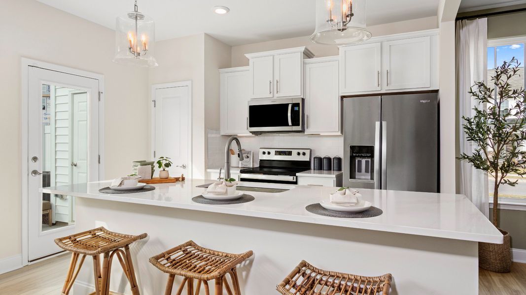 Furnished interior in a model home at Essex Townes in Franklinton (Image 8). Furnished interior in a model home at Essex Townes in Franklinton (Image 8).