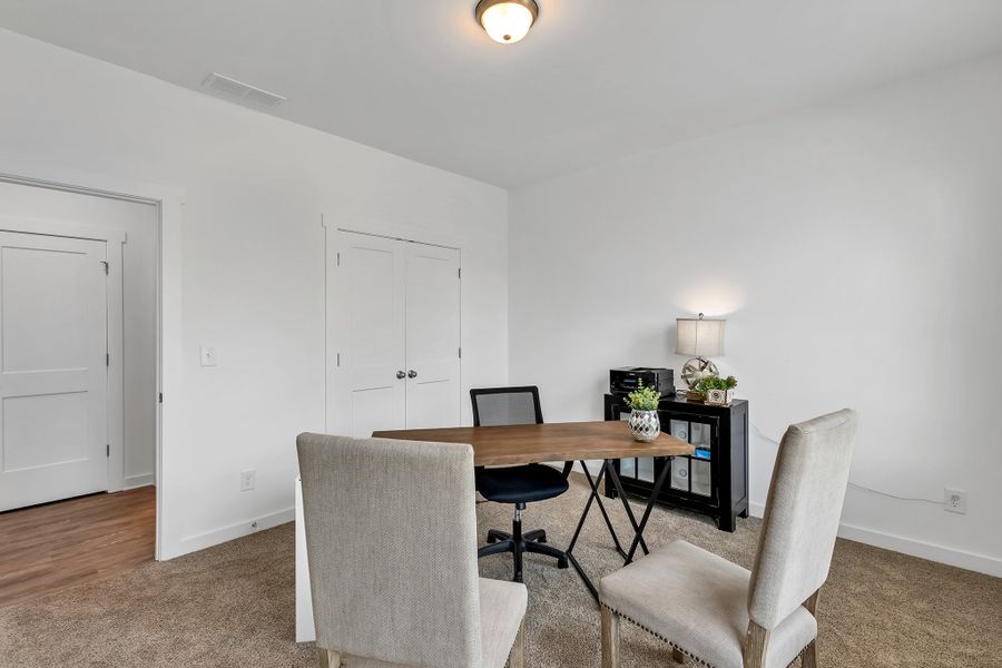 Furnished interior in a model home at Langston Place in Perry (Image 14).