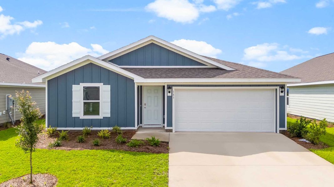 Front exterior of a home in the Owl's Head Farms community, located in Freeport, FL (Image 4).