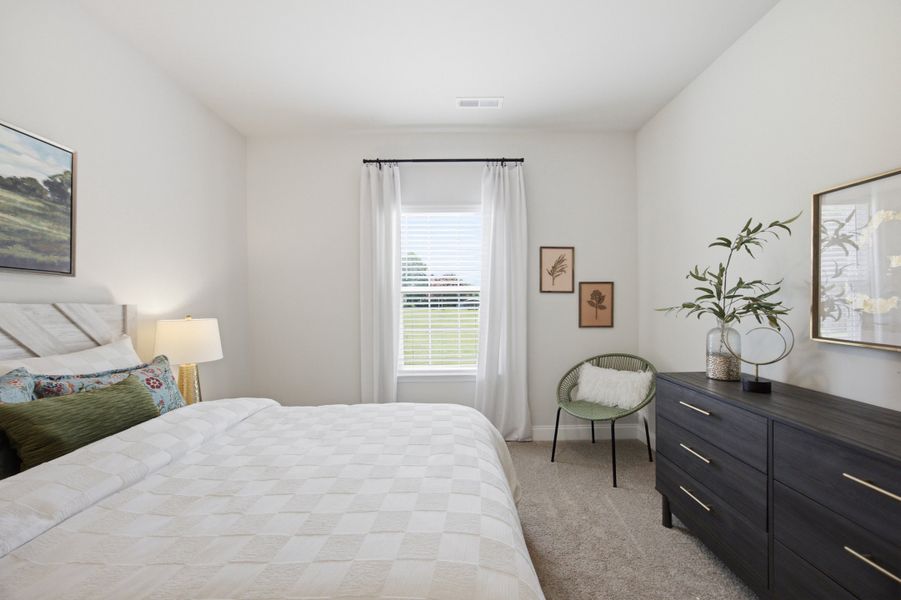 Furnished interior in a model home at Northlake in Statesville (Image 29).