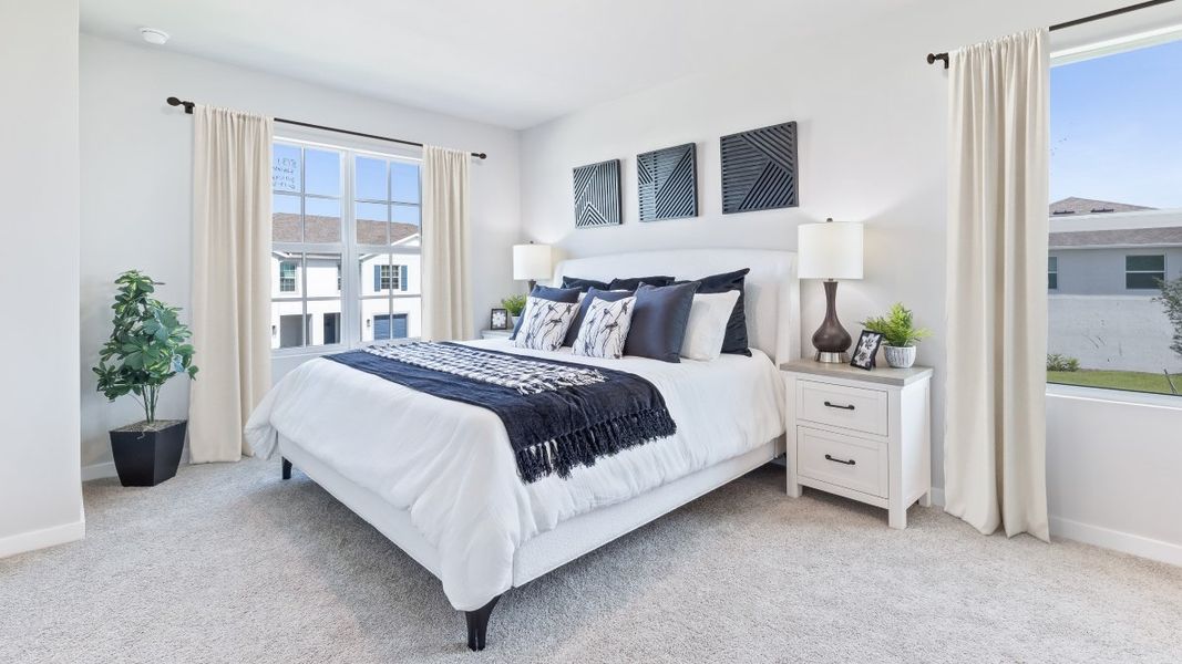 Furnished interior in a model home at Asher Park in Lehigh Acres (Image 18).