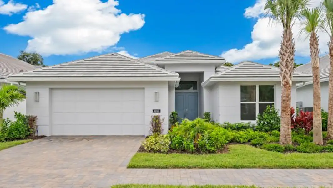 Front exterior of a home in the Lucaya Pointe community, located in Vero Beach, FL (Image 6).