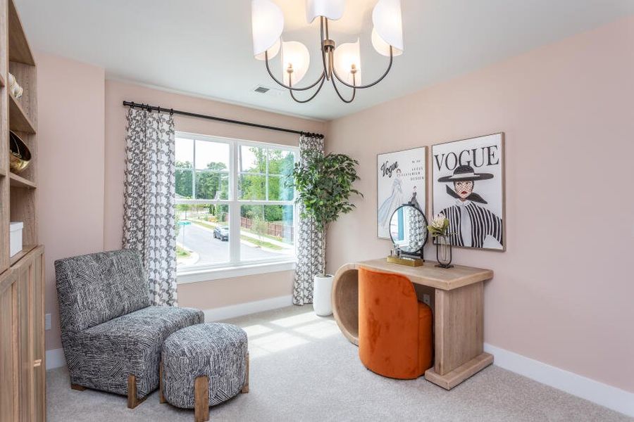 Furnished interior in a model home at Running Brook Townes in Durham (Image 23).