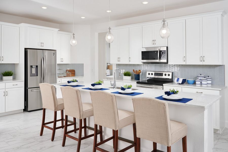 Furnished interior in a model home at Leela Reserve in Tavares (Image 6).