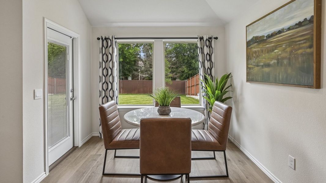 Furnished interior in a model home at Three Oaks in Sherman (Image 21).