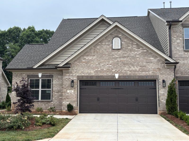 Front exterior of a home in the Mebane Towne Center community, located in Mebane, NC (Image 13).