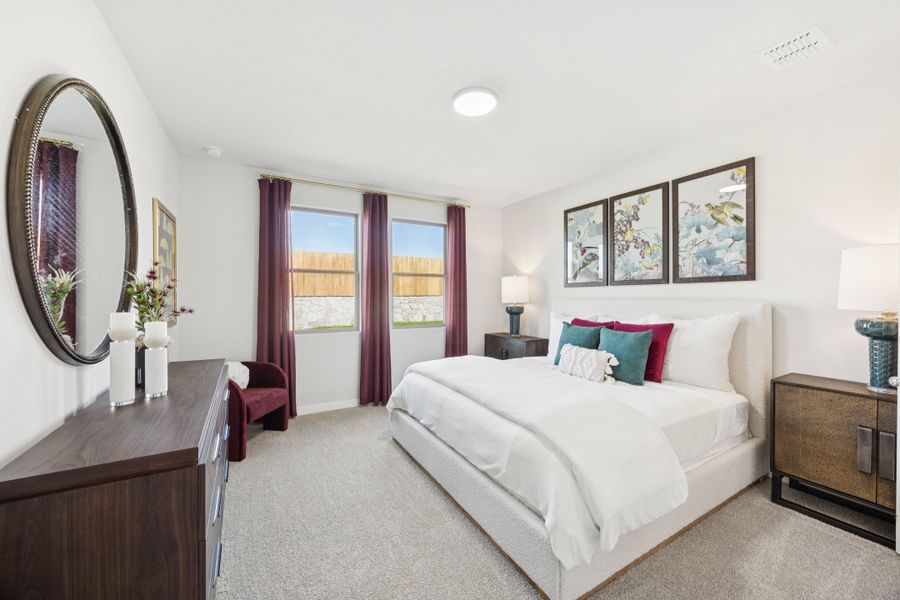 Primary Suite in a Belmont Magnolia Model Home in Aubrey TX by Trophy Signature Homes Primary Suite in a Belmont Magnolia Model Home in Aubrey TX by Trophy Signature Homes