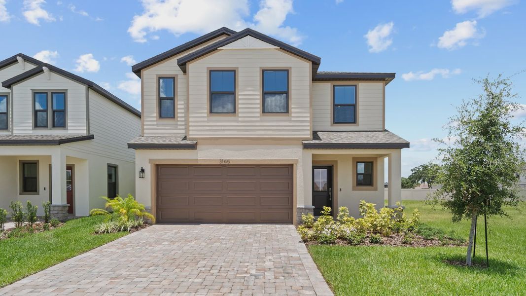 Explore The Naples at Grasslands West—a beautifully designed two-story new construction home located in a gated community.