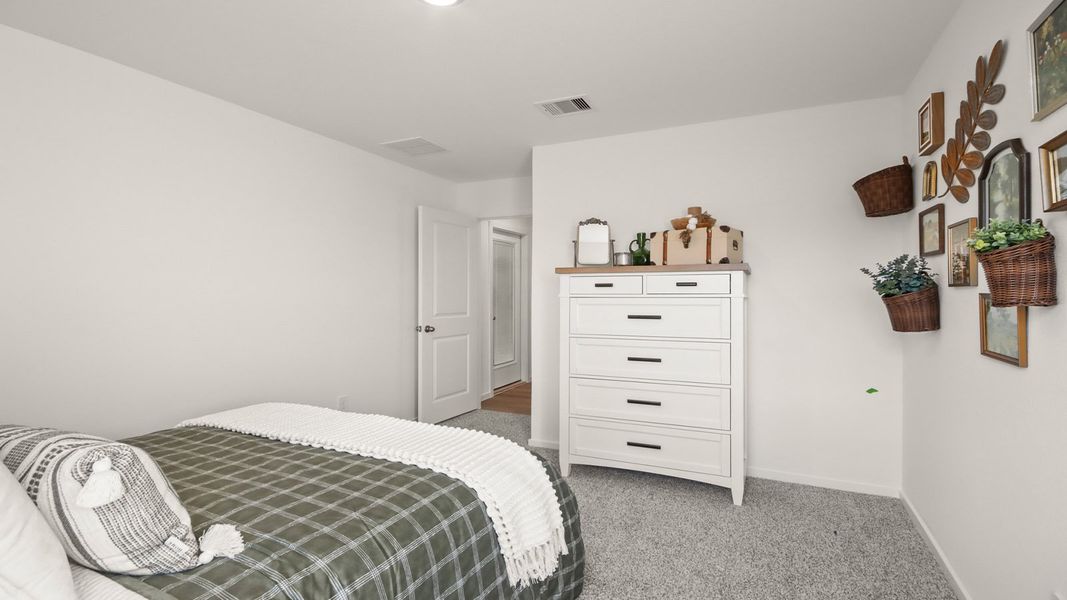 Furnished interior in a model home at New Waverly Station in New Waverly (Image 24).