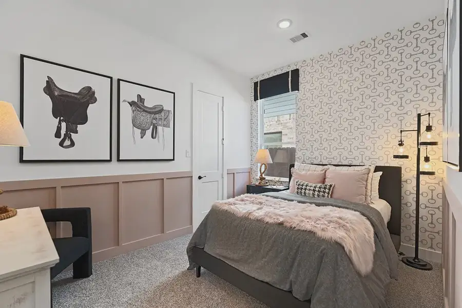 Furnished interior in a model home at Brookewater 60's in Rosenberg (Image 27).