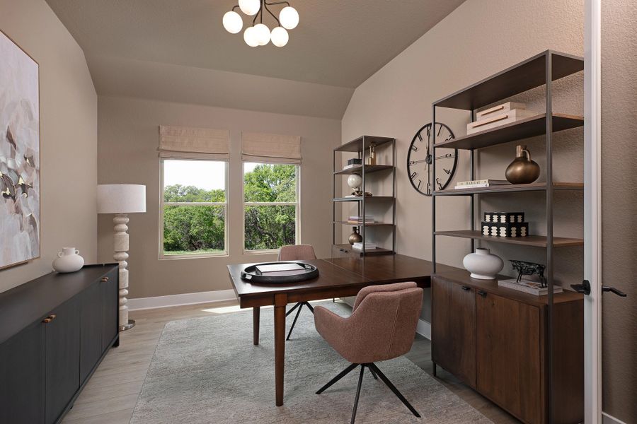 Furnished interior in a model home at Willow Springs in Buda (Image 6).