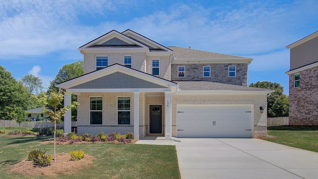 Front exterior of a home in the Burchwood community, located in Stockbridge, GA (Image 13).