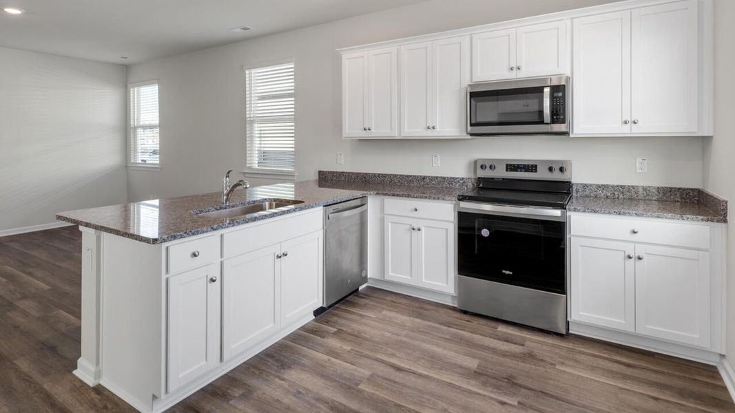 Furnished interior in a model home at The Cottages at Blake Farm in Wilmington (Image 19).