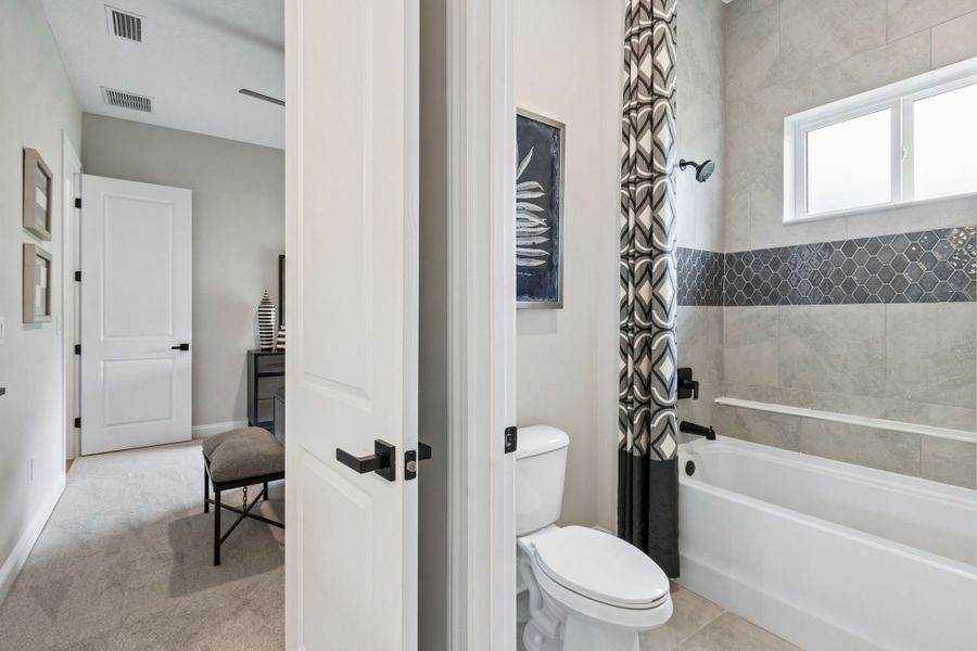 Furnished interior in a model home at Sandy Bluff in Yulee (Image 36).