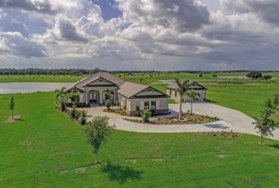 Front exterior of a home in the Hampton Lakes community, located in Sarasota, FL (Image 31). Front exterior of a home in the Hampton Lakes community, located in Sarasota, FL (Image 31).