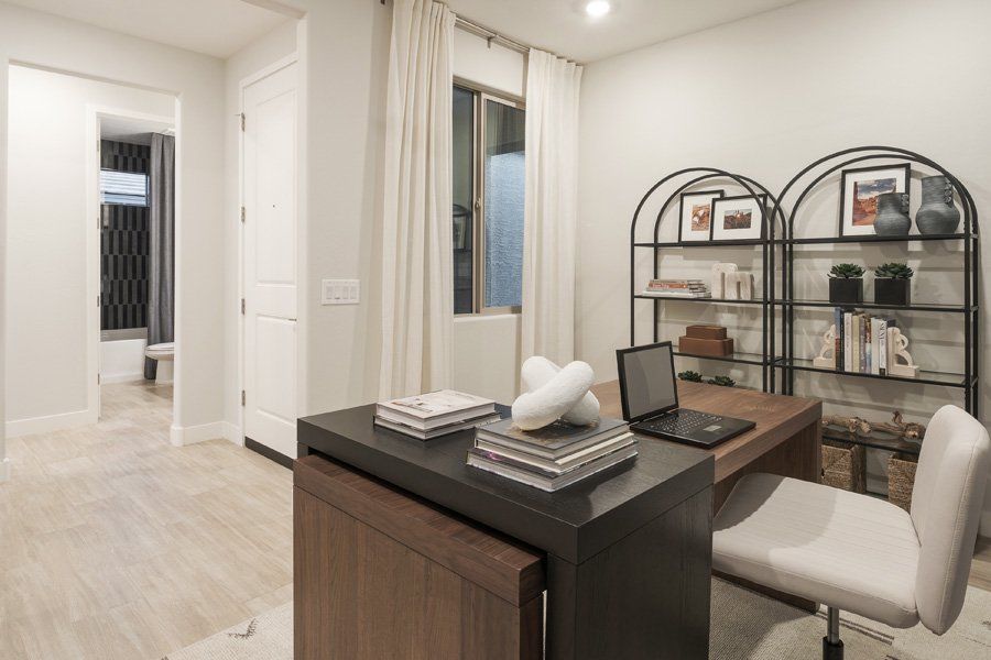 Furnished interior in a model home at Windrose V in Waddell (Image 35).