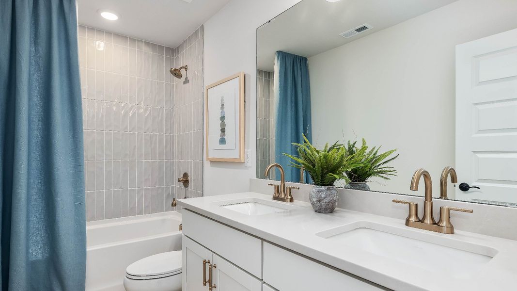 Furnished interior in a model home at Jasper Landing in Four Oaks (Image 50).